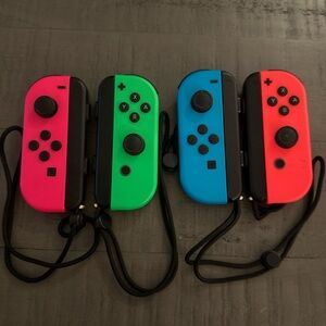 Nintendo Joy-Con Controllers - Vibrant Pink, Green, Blue, and Red